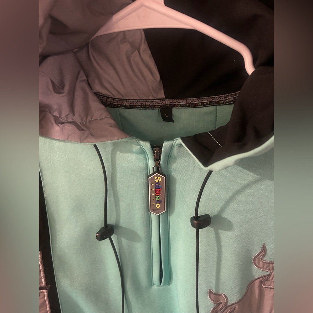 Men’s Teal Jacket and sweat pants